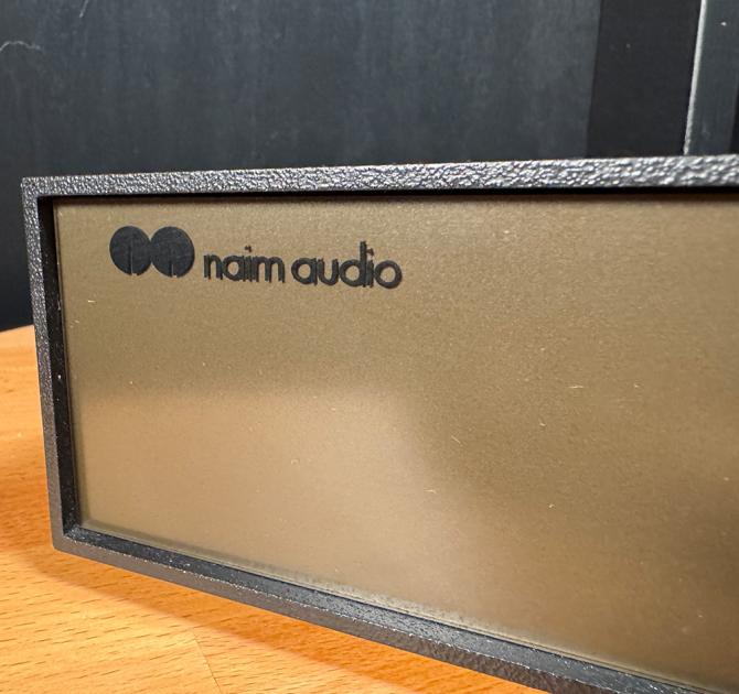 NAIM NAP 140 close-up of the Naim logo