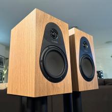 A pair of oak Linn 119 Loudspeakers in the ripcaster showroom