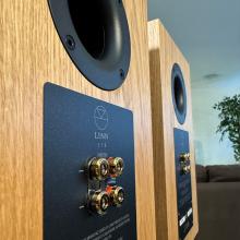 A pair of oak Linn 119 Loudspeakers in the ripcaster showroom