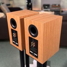 A pair of oak Linn 119 Loudspeakers in the ripcaster showroom