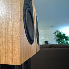 A pair of oak Linn 119 Loudspeakers in the ripcaster showroom