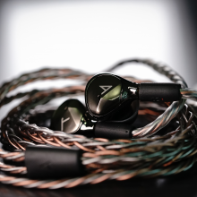 Astell & Kern AKT9iE Earphones Black with chord coiled.