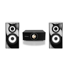 A pair of Cabasse Minorca MC40 Bookshelf speakers either side of the Cabasse AMP 240 S