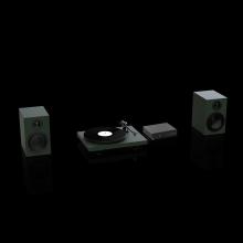Two speakers and a turntable in green with a Project Maia S3