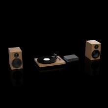 Two speakers and a turntable in walnut with a Project Maia S3