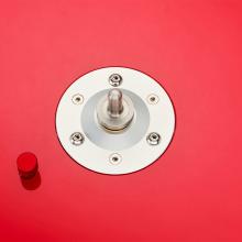 Vertere DG-X Turntable in red - close-up of the switch