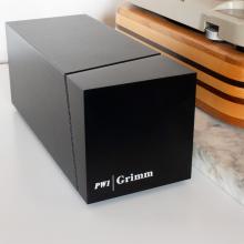 Grimm Audio PW1 Phono Preamplifier beside a turntable