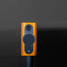 A single Kii Three Loudspeaker in Orange