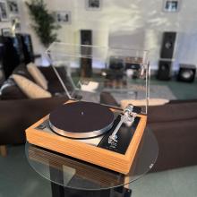 Linn Majik MM LP12 Fluted turntable in oak in the ripcaster showroom with sofas and speakers in the background along with other HiFi equipment