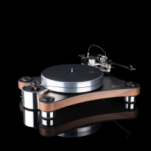 VPI Prime 21 Turntable in walnut on a black background with a reflection
