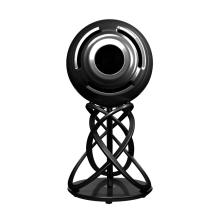 A large spherical speaker on an elaborate stand consisting of twisted legs